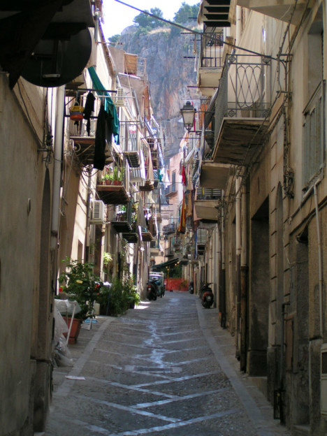 Typical narrow street in Sicilian towns, Italy