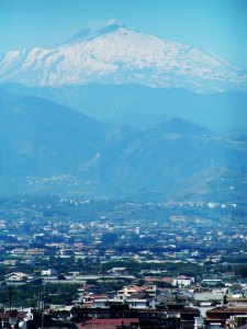 Snowy Mount Etna as seen from Milazzo, Sicily, Italy