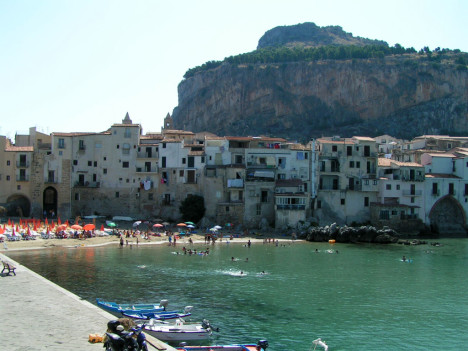 Cefalu, beach in the middle of town, Sicily, Italy